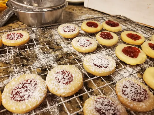 Thumbprint Cookies on rack with Sugar